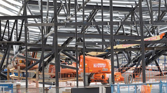 The collapsed roof of the Kew Recreation Centre in inner-eastern Melbourne’s Kew in 2022. The local council has not yet confirmed a budget to complete the project delayed by 20 months.