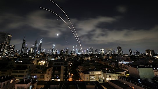 Israel’s air defence system fires to intercept missiles during an Iranian attack over Tel Aviv on Wednesday, June 18.