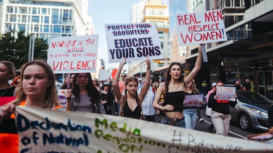 Women rally in Sydney’s CBD on Saturday.