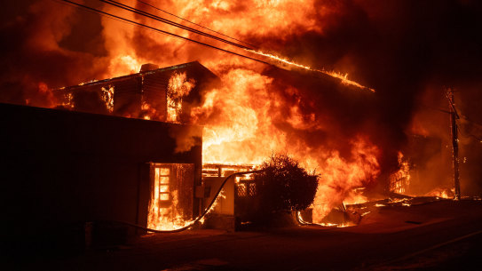 Officials did not give an exact number of structures damaged or destroyed in the Pacific Palisades wildfire, but they said about 30,000 residents were under evacuation orders and more than 13,000 structures were under threat.