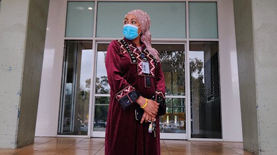 Ruth Eyakem, a resident of one of the  Flemington social housing towers, outside her building on Saturday.