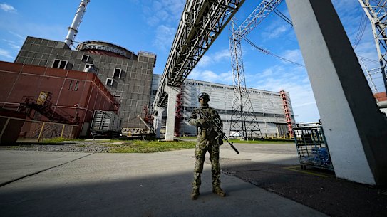 A Russian serviceman guards in an area of the Zaporizhzhia Nuclear Power Station in territory under Russian military control, southeastern Ukraine.