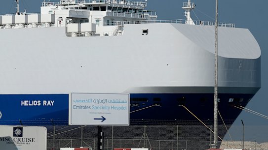 The Israeli-owned cargo ship, Helios Ray, sits docked in Dubai after it was damaged by an unexplained blast at the gulf of Oman.