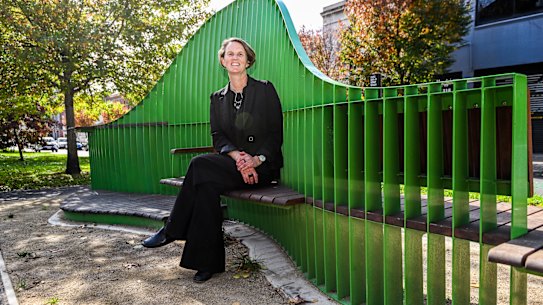 Obelia Tait uses the Carlton “smart bench” she helped conceptualise.
