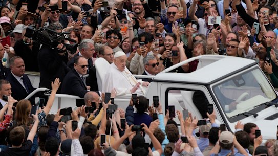 Pope Francis tours St Peter’s Square in his popemobile at the Vatican Sunday, April 20, 2025.