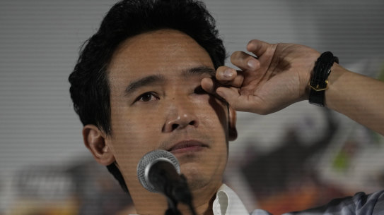 Former leader of Move Forward Party, Pita Limjaroenrat, crying as he meets his supporters.