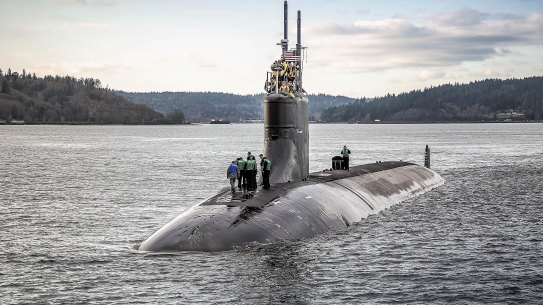 Defence Minister Peter Dutton said on Sunday the government would bring forward a decision on whether to choose British or American nuclear submarines for construction in Australia.