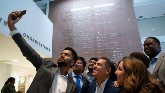 Florida Democrat Maxwell Frost takes a selfie with current and incoming Congressional Progressive Caucus members in Washington.