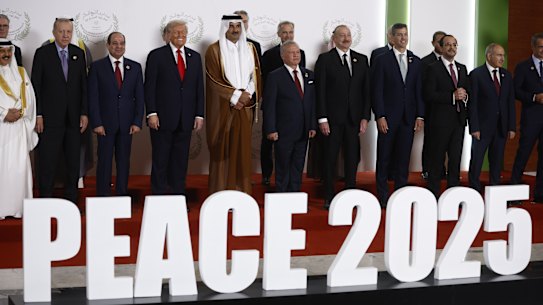 From the left, Turkish President Recep Tayyip Erdogan, Egyptian President Abdel Fattah al-Sisi, US President Donald Trump, Emir of Qatar Cheikh Tamim ben Hamad al-Thani, King Abdullah II of Jordan, and fellow dignitaries pose during the family picture at the Gaza International Peace Summit, in Sharm el-Sheikh, Egypt, Monday, Oct.13 2025. (Yoan Valat, Pool photo via AP)