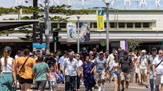 Over one thousand pedestrians for the lights to change at the Manly intersection.