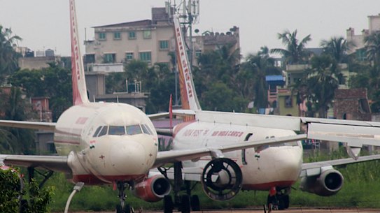 Planes parked at Kolkata Airport.