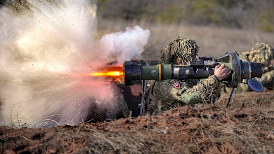 A Ukrainian soldier fires an anti-tank weapon in eastern Ukraine.
