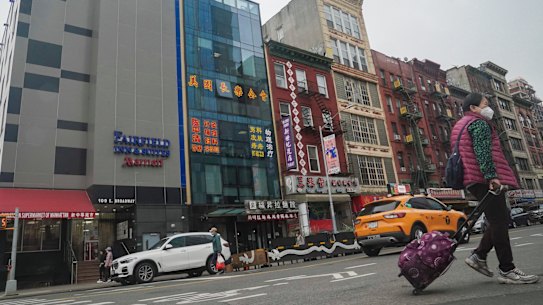 The glass facade building, second from left, is believed to be the site of a foreign police outpost for China in New York’s Chinatown.