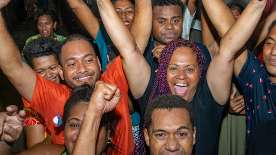 People’s Alliance supporters celebrate the Rabuka’s return to the top job in Suva, Fiji.