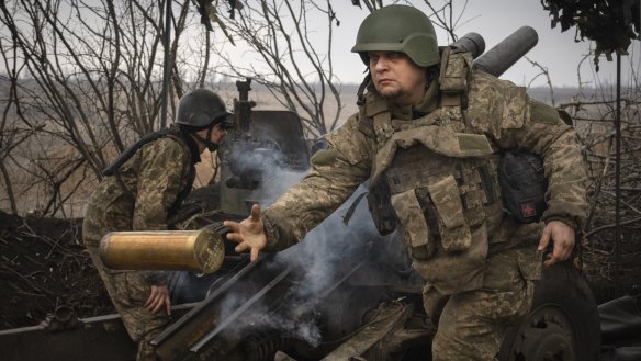Ukrainian soldiers with the 71st Jaeger Brigade fire a M101 howitzer at Russian positions on the front line, near the city of Avdiivka in Ukraine’s Donetsk region.