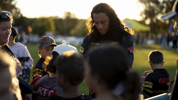Fan favourite: Jarome Luai takes time out with the Bathurst locals.