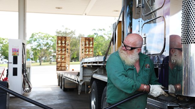 Truck driver Chris Gibbs fills the tank.  Australia’s dependency on diesel has become a major problem in the Iran fuel crisis.