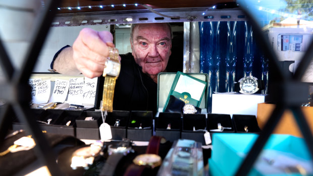 Rob Herron has owned and operated Crows Nest Pawn Shop for 35 years. He says business has been slow since the pandemic, but he still sees people come in struggling to pay their household bills. 
