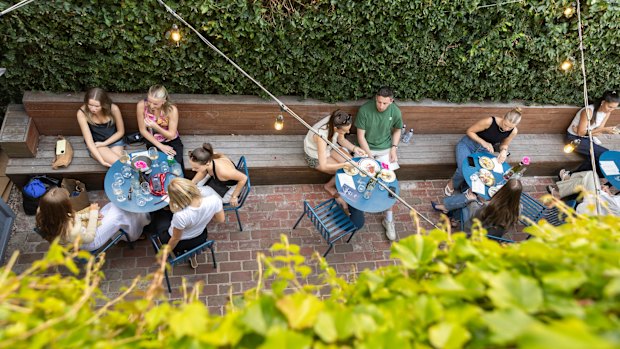 Gracie’s lush courtyard is popular on weekends.