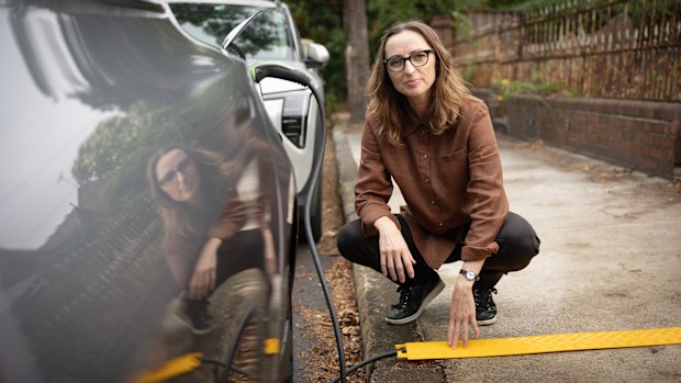 Electrification and EV advocate Sarah Aubrey with her authorised cable cover.