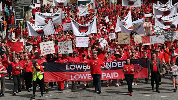 Teachers, principals and support workers throng the streets of Melbourne on Tuesday protesting pay, conditions and schools funding.