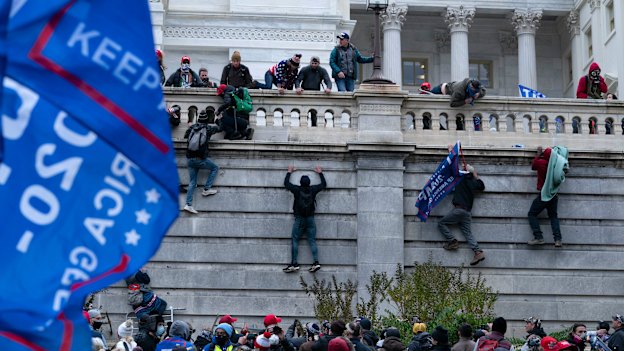 Trump supporters storm the US Capitol building in Washington, DC on January 6.