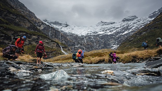 Contestants traipse through the wilderness of New Zealand’s South Island on the reality TV survival show The Summit.