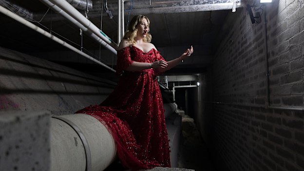 Hannah Burton tests acoustics in The Void, a rarely seen space that drops as much as 18 metres beneath the ground separating the old and new wings of the Sydney Conservatorium of Music.