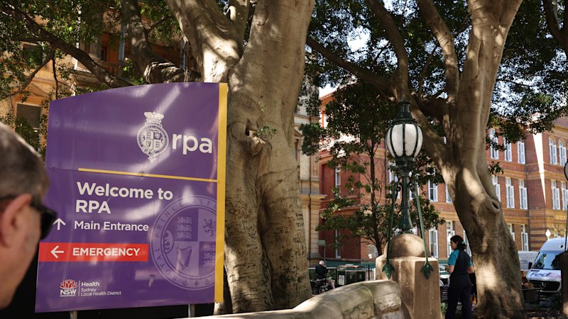 Man fights for life after alleged midnight hammer attack at Sydney hospital