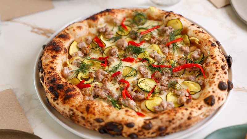 This neighbourhood gem captures the seasons with its vivid pizza toppings