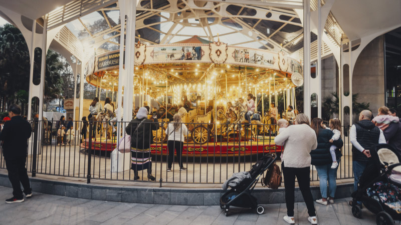 After eight years, Darling Harbour carousel reopens