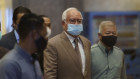 Najib Razak, centre, pictured at an earlier court appearance in April this year.