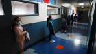 Students social distance at a school in Los Angeles, although most students are still learning from home.