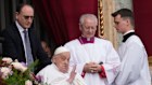 Pope Francis appears on the central lodge of St. Peter’s Basilica to bestow the Urbi et Orbi blessing at the end of the Easter mass presided over by Cardinal Angelo Comastri in St. Peter’s Square at the Vatican Sunday, April 20, 2025.