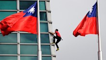 Rock climber Alex Honnold performs a free solo climb of the Taipei 101 skyscraper. 
