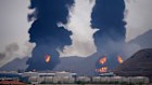 Plumes of smoke and fire rise after debris from an intercepted Iranian drone struck an oil facility in the United Arab Emirates at the weekend.