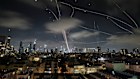 Missile and interceptor trails in the sky above Tel Aviv.