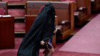 Senator Pauline Hanson wears a burqa in the Senate.
