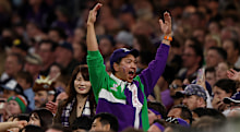 Fremantle fans celebrate beating Geelong. 