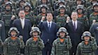 Taiwan President Lai Ching-te, centre, with soldiers in October.