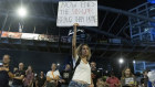 A protester holds a sign during a demonstration calling for an hostages deal on October 17, 2024 in Tel Aviv, Israel.