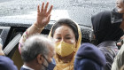 Rosmah Mansor, wife of former Malaysian prime minister Najib Razak, waves as she leaves the High Court in Kuala Lumpur, after being convicted of taking bribes.