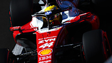 Hamilton sits in his car during qualifying.