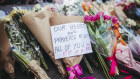 The aftermath of a psychotic attack: floral tributes build up at Bondi Junction. 