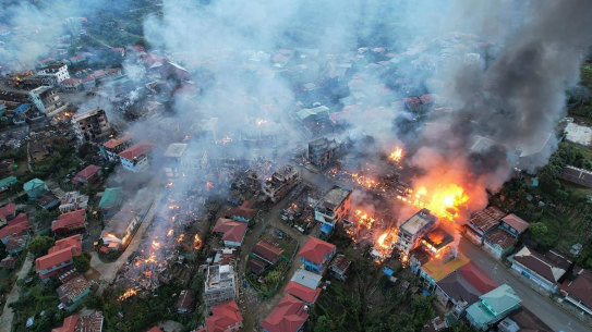 In this photo released by the Chin Human Rights Organisation, fires burn in the town of Thantlang in Myanmar’s northwestern Chin state on October 29.