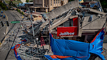 A collapsed Jollibee store following a magnitude 7.8 earthquake on June 09, 2026 in General Santos, Sarangani province, Philippines