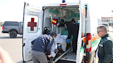 Bulgarian authorities take an injured crew member to a hospital after two commercial vessels were attacked in the NATO member’s Black Sea economic zone on Tuesday, October 6.