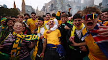Fans watch the Socceroos play Turkey from Melbourne’s Federation Square on June 14.
