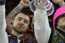 Members of the Kalush Orchestra from Ukraine celebrate after winning the Grand Final of the Eurovision Song Contest in Turin, Italy.