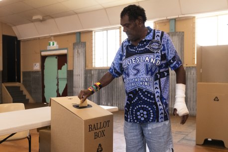 Alfred Murdoch casts his vote at the Cherbourg voting centre in the Queensland seat of Wide Bay. It was one of just three booths in the seat to vote Yes.